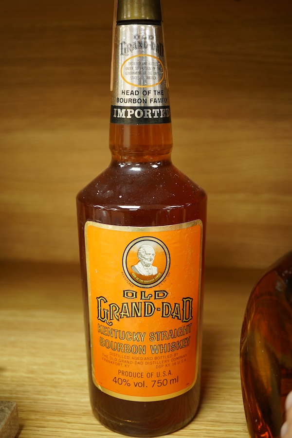 A bottle of Dimple whisky, Old Grand-Dad Bourbon whiskey and Stewarts Cream of the Barley